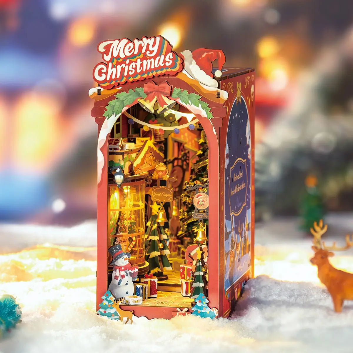 Decorative Christmas box with festive elements and 'Merry Christmas' text on a blurred background.