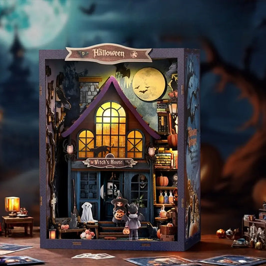 Halloween-themed dollhouse with a witch's house sign, surrounded by spooky decorations.
