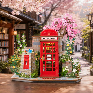 Blossom Corner DIY Book Nook displayed in a charming spring bookshop street with blooming cherry blossoms